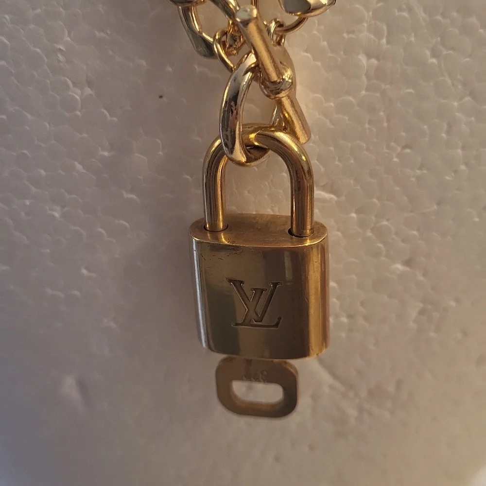 Louis vuitton trio shined by them gorgeous gold plated chocker lock key numbered